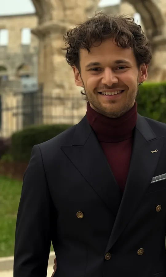 The same shopper wearing the double-breasted blazer